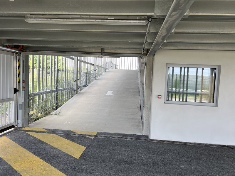 Covered car park + shuttle service