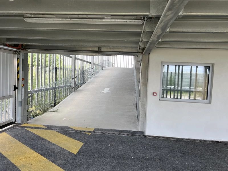 Covered car park + shuttle service