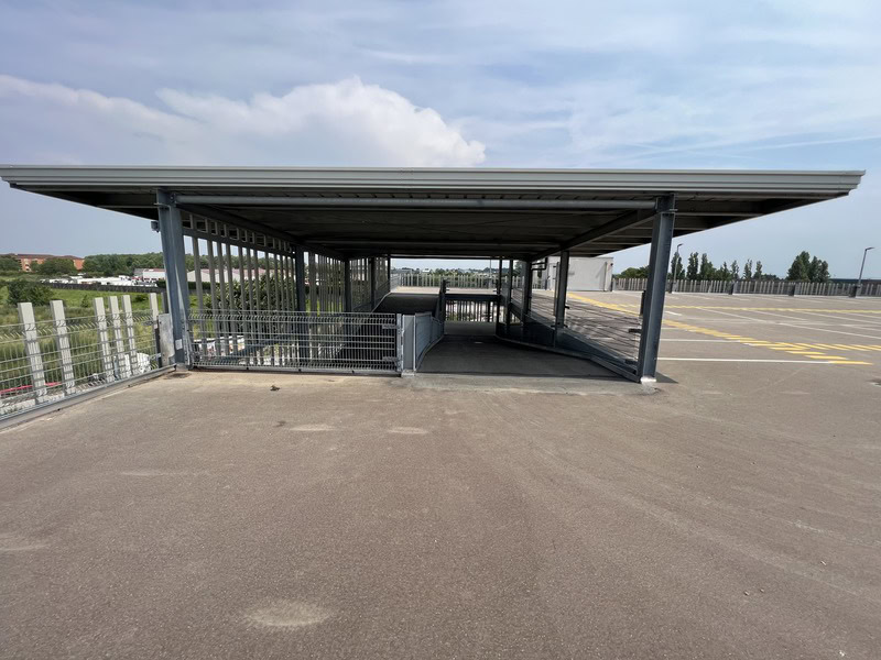 Outdoor car park + shuttle service